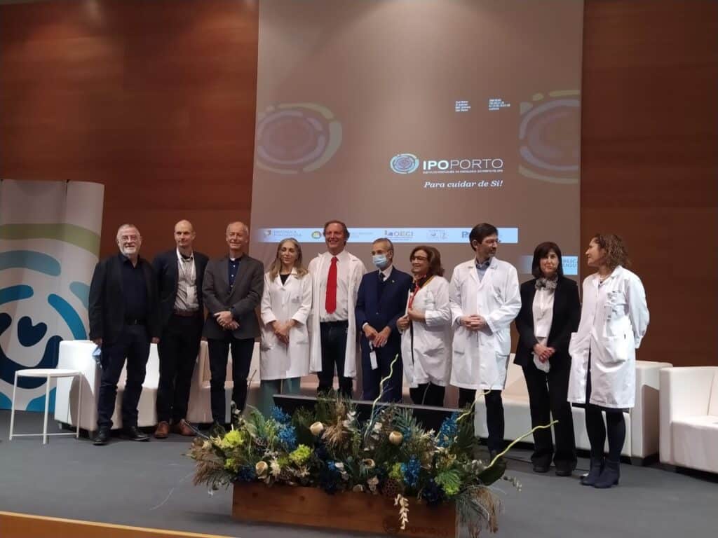Researchers pose for a photo at the International Symposium